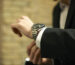 A man trying on one of the many different rolex styles available for sale at Wolvyn