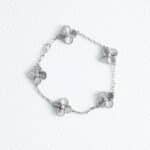 Van Cleef & Arpels 18K White Gold Vintage Alhambra bracelet, 5 Silver Motifs